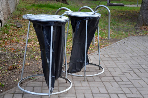 istock the cheapest solution for garbage cans or garbage cans used in cemeteries and concerts. throw garbage directly into a black plastic bag with a lid 1311427359