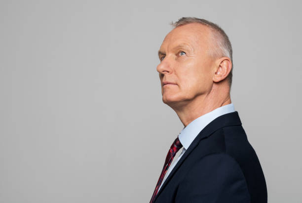 istock Side view of thoughtful senior businessman 1311432055