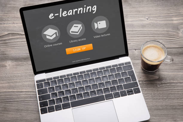 istock Concept of e-learning, online courses, webinars and distance learning on laptop computer 1311432439