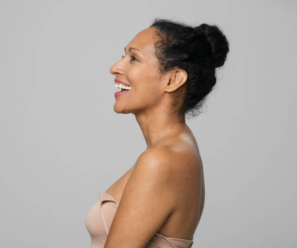 istock Side view of smiling mature woman 1311432492