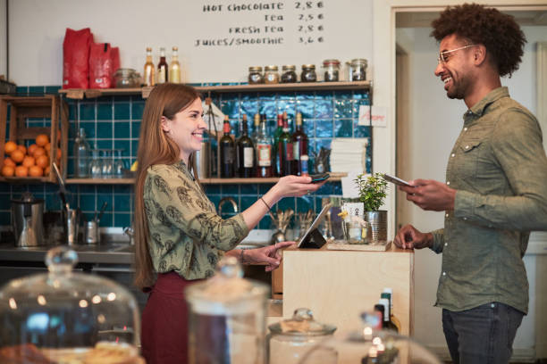 istock Contactless paying in a small business 1311433386