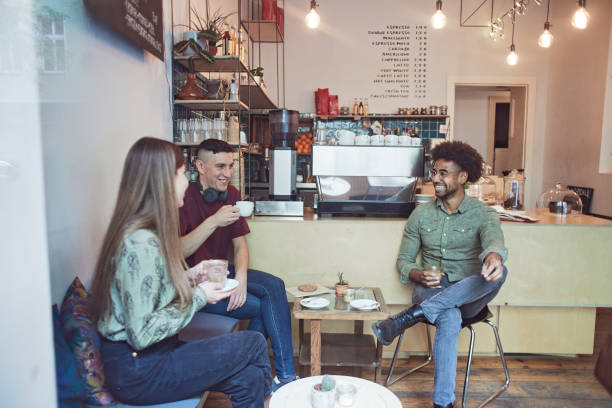 istock Friends relaxing having a coffee in a cafeteria 1311433443