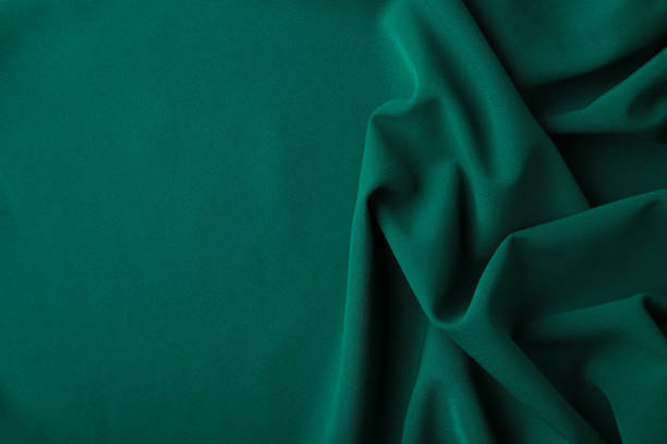 istock Luxury green satin background for your text 1311435816