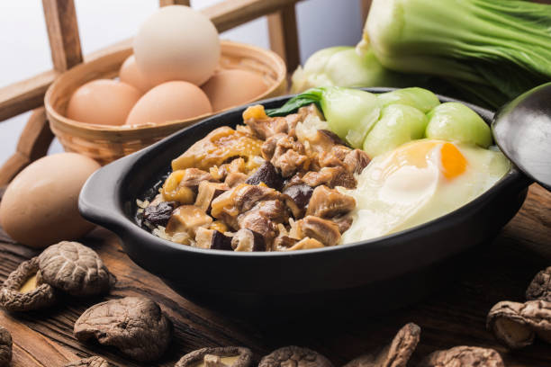 istock Cantonese style rice with chicken and mushroom 1311437535
