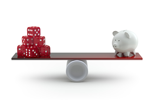 Dice Stack and Piggy Bank Balancing on a Seesaw. 3d Rendering