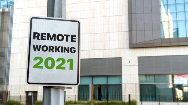 istock Remote working 2021 sign in a downtown city setting 1311440125