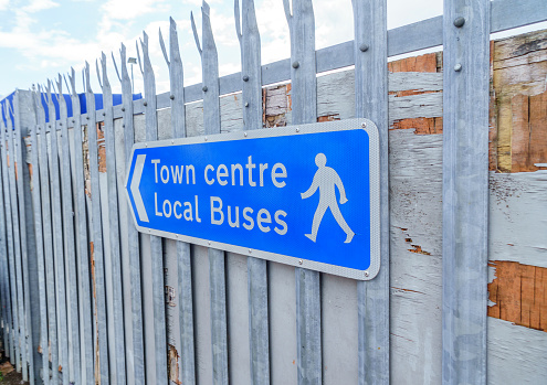 To town centre and buses sign