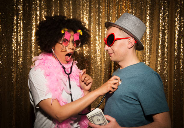 istock Friends enjoying party with props 1311441281