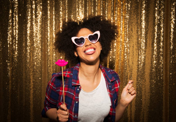 istock Young woman enjoying party 1311441304