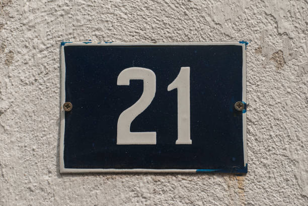 istock Weathered enamelled plate number 21 1311441337