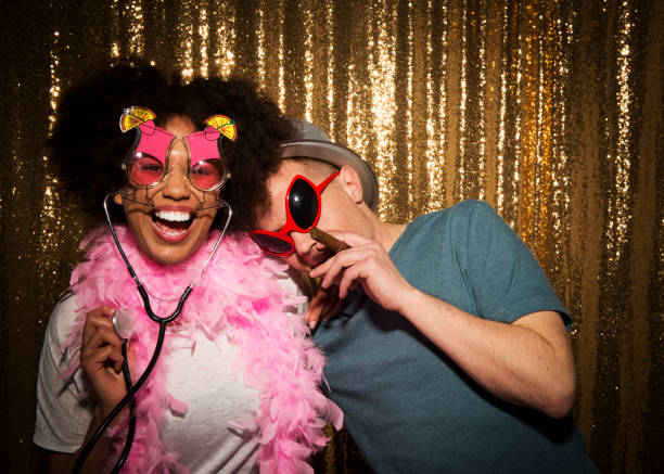 istock Friends enjoying party with props 1311441364