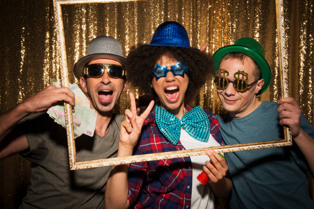 istock Friends enjoying party with props 1311441376