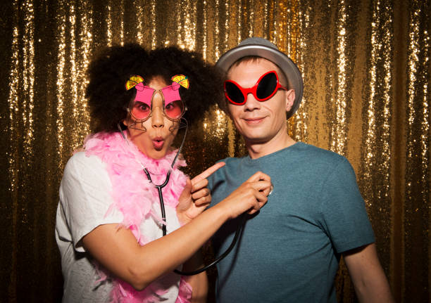 istock Friends enjoying party with props 1311441462