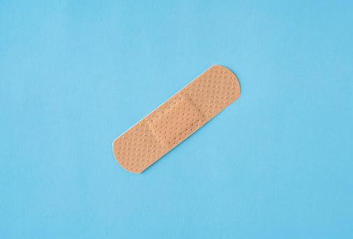 Band-aid on blue background