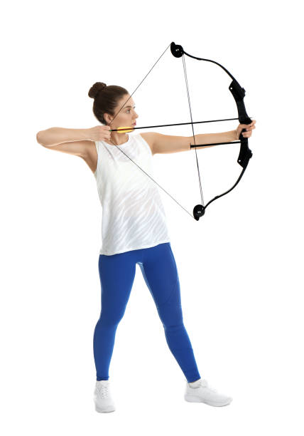 istock Woman with bow and arrow practicing archery on white background 1311443718