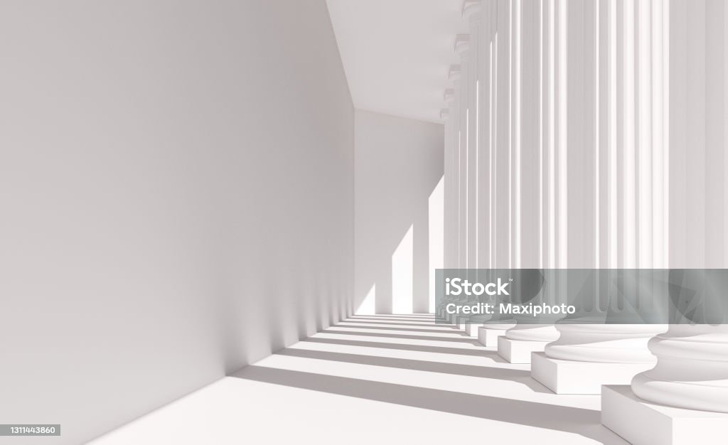 White columns in a row: neoclassical architecture Classical white columns in a row casting shadows on a wall. Abstract architecture resembling a government building dedicated to law, justice and education. Digital image. Law Stock Photo