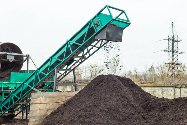 istock Producing organic soil at industrial compost plant 1311446205