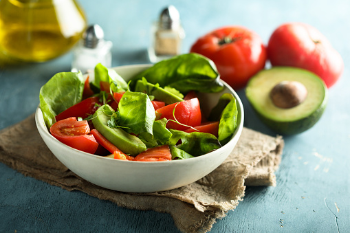 Healthy avocado salad with tomatoes
