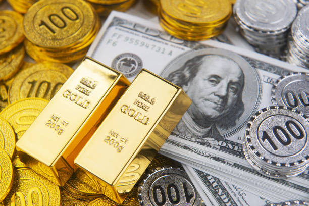 istock Gold and dollars.Financial concept 1311447007