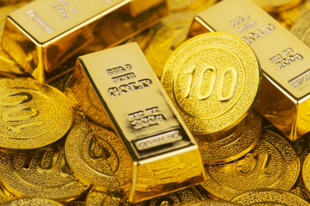 istock Gold bars and gold coins 1311447387
