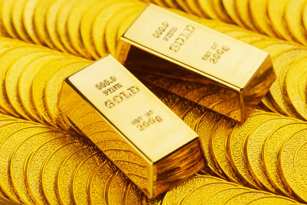 istock Gold bars and gold coins 1311447647