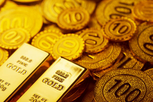 istock Gold bars and gold coins 1311447781