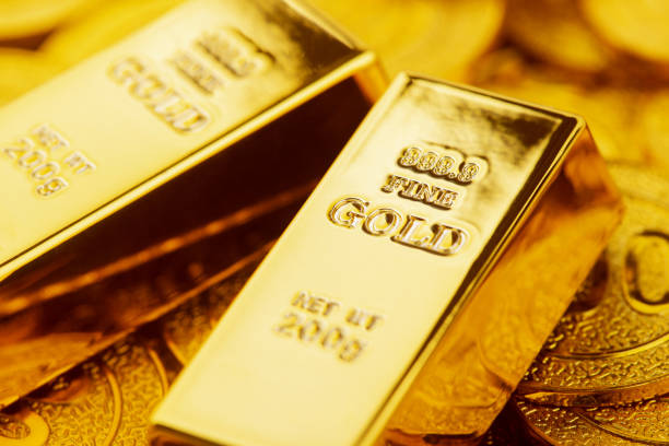 istock Gold bars and gold coins 1311447828