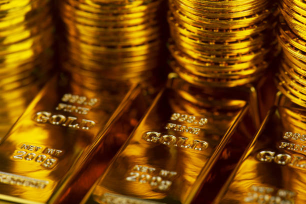 istock Gold bars and gold coins 1311447889