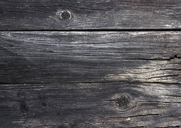 istock Abstract background. Old wooden blackened wall 1311450692