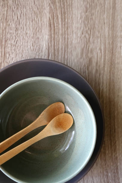 istock Ceramic Bowls and Wooden Spoons 1311451930