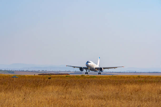 istock Passenger plane takes off from runway in airport 1311452124
