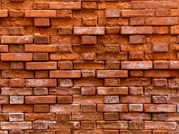 istock Horizontal part of a Venetian old red brick wall, background, 1311454301
