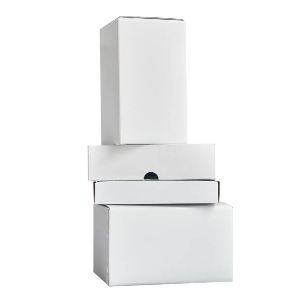 istock Mockup of four containers for goods stacked by a tower. Packaging boxes on a white background. 1311454880