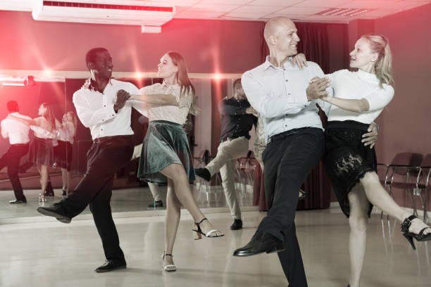 istock People dancing rock-and-roll in pairs 1311456057