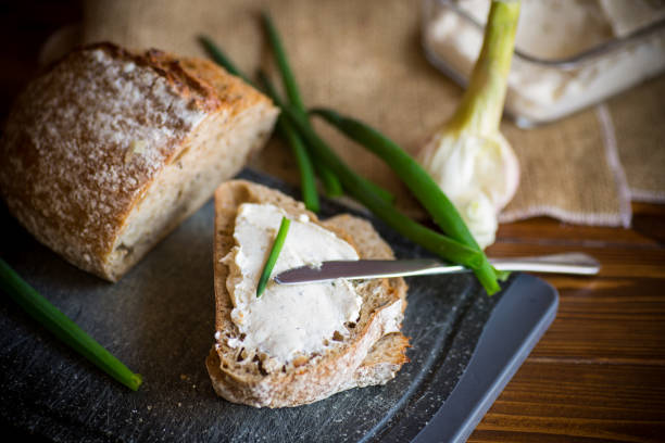 istock Homemade buckwheat bread with garlic cheese spread 1311457878