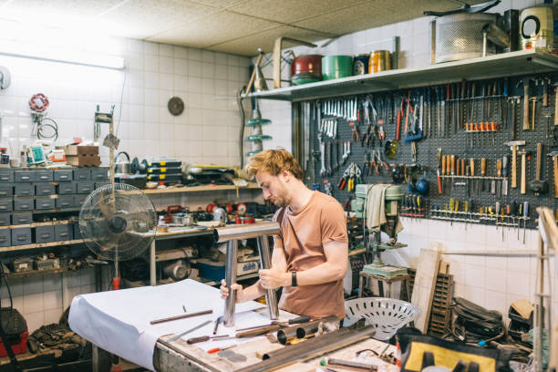 istock Young man working on chair design 1311457944