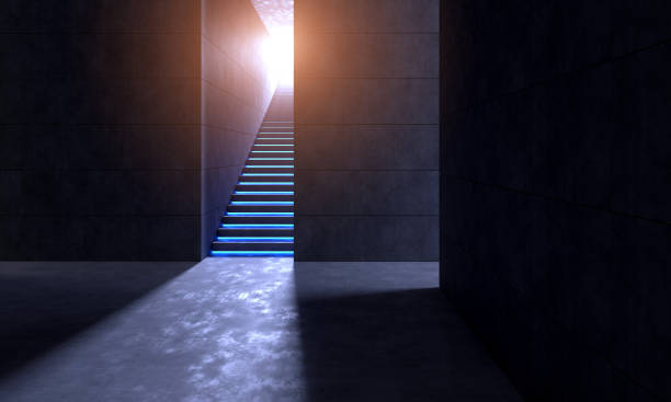 istock Illuminated staircase goes up to warm sunlight 1311458100