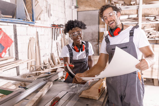 istock A Couple of Multi-Ethnic Carpenters is Analyzing New Ideas For a Carpentry Works. 1311464586