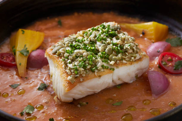 Pan Seared Halibut with Pumpkin Seed Gremolata with a Coconut Curry Sauce