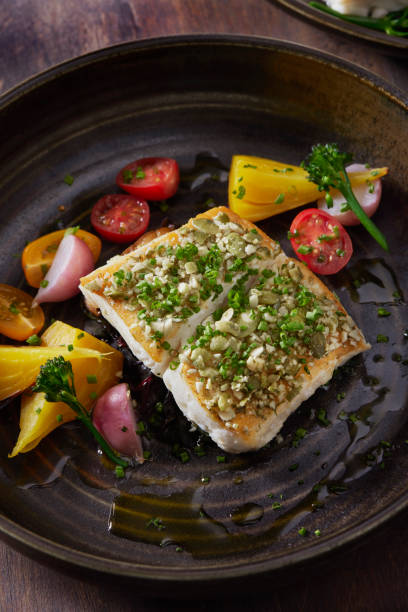 istock Pan Seared Halibut with Pumpkin Seed Gremolata 1311468669