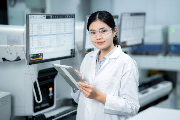 istock Laboratory technician, Asian medical technicians work in private laboratories. 1311473575