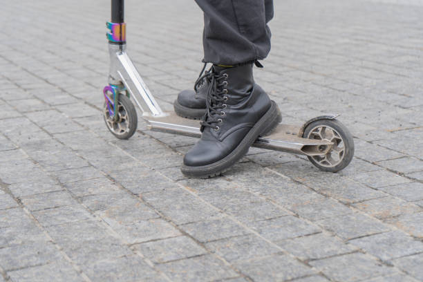 istock teenager on scooter 1311476160