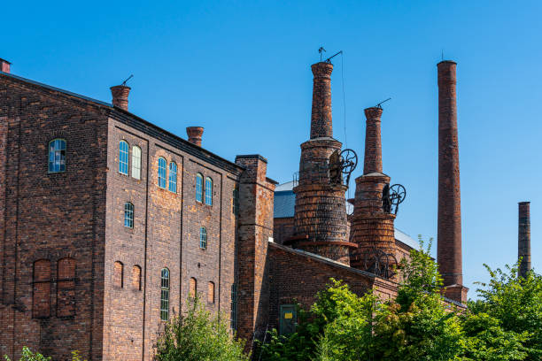 Old closed down blast furnace or steel mill in Forsbacka. Brick buildings and chimneys from the early industrialism in Sweden.