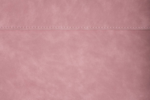 светло-розовая кожа с горизонтальным фоном текстуры шва - лента для шитья стоковые фото и изображения