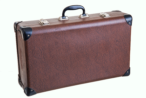 old vintage brown suitcase isolated on white background