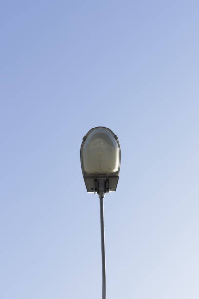 istock blue sky urban city lighting lamp 1311478100