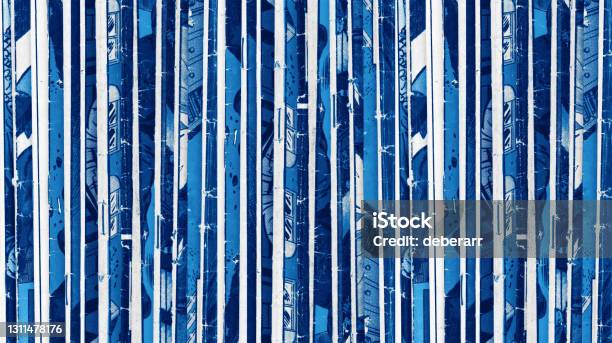 Old Comic Books Stacked In A Pile Creates Textured Background Pattern With Blue Monotone Colors Stock Photo - Download Image Now