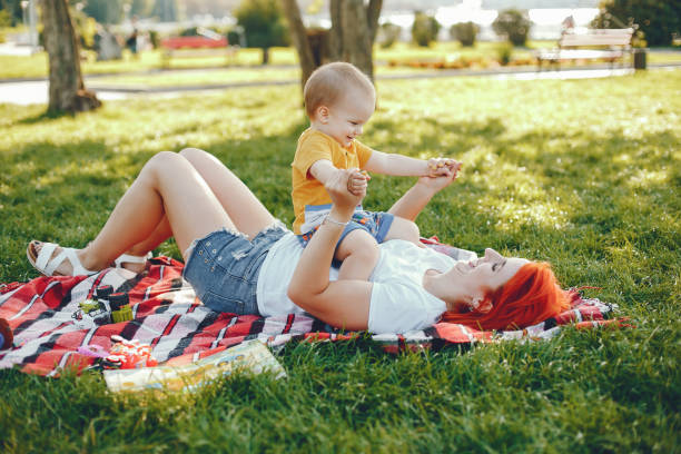 istock Mother with son playing in a summer park 1311479281
