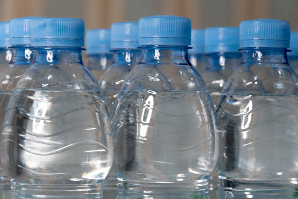 istock Close up bottles with blue cap in the same high 1311479386
