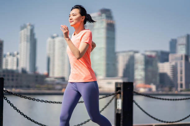 istock Female running in the city 1311479700